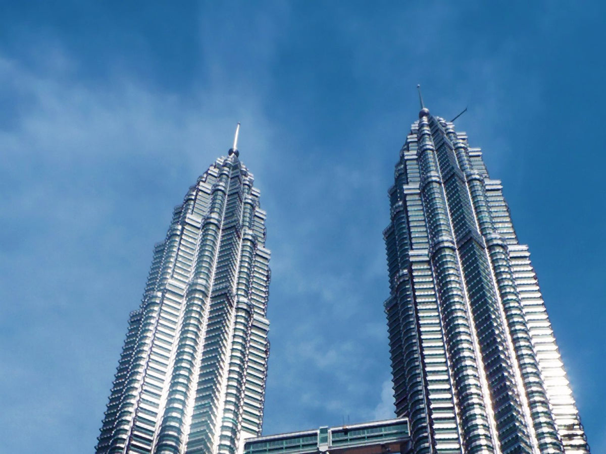 Petronas Twin Towers against blue sky in Kuala Lumpur, Malaysia