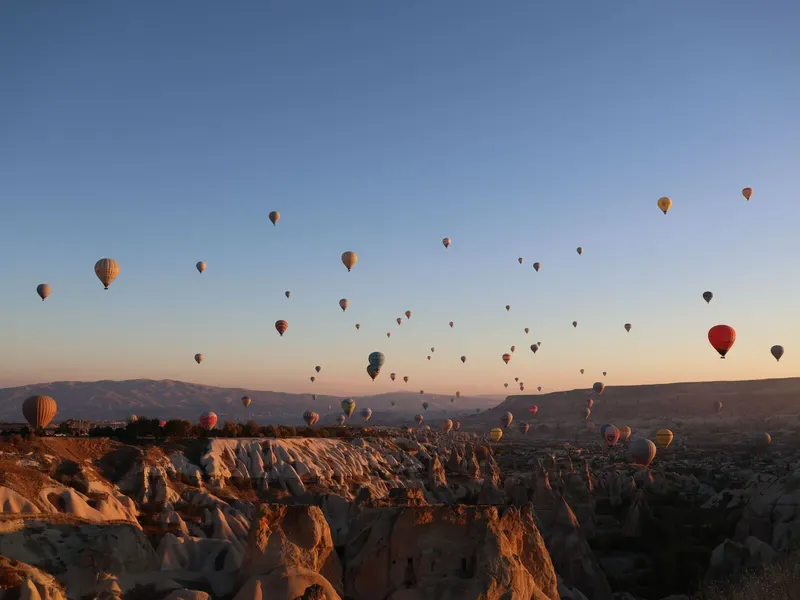 Hot air balloons over the valleys of Cappadocia, Turkey
